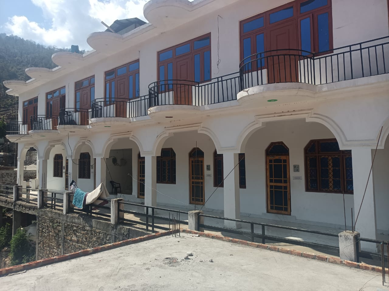 Lush forest view from hotel balcony
